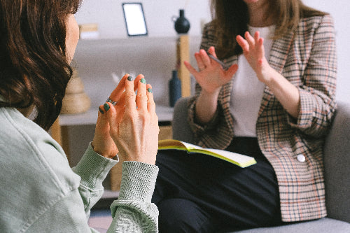 Therapist and patient talking during a counseling session