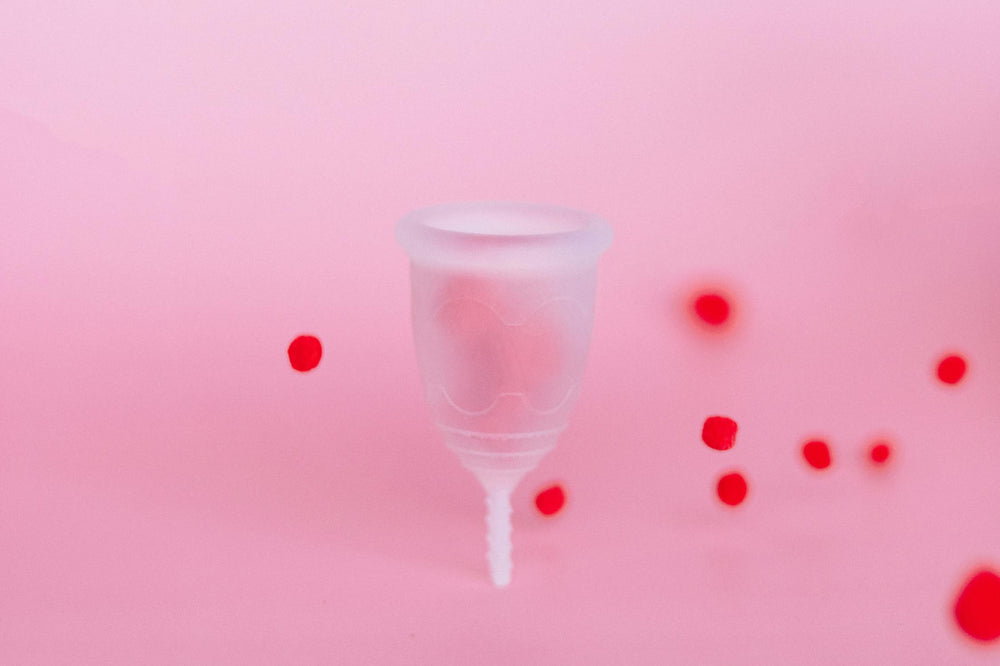 Menstrual Cup with Spots surrounding it