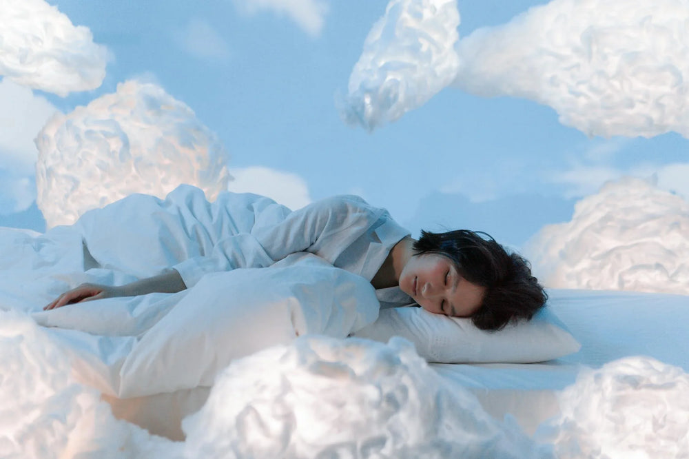 Woman sleeping on a cloud
