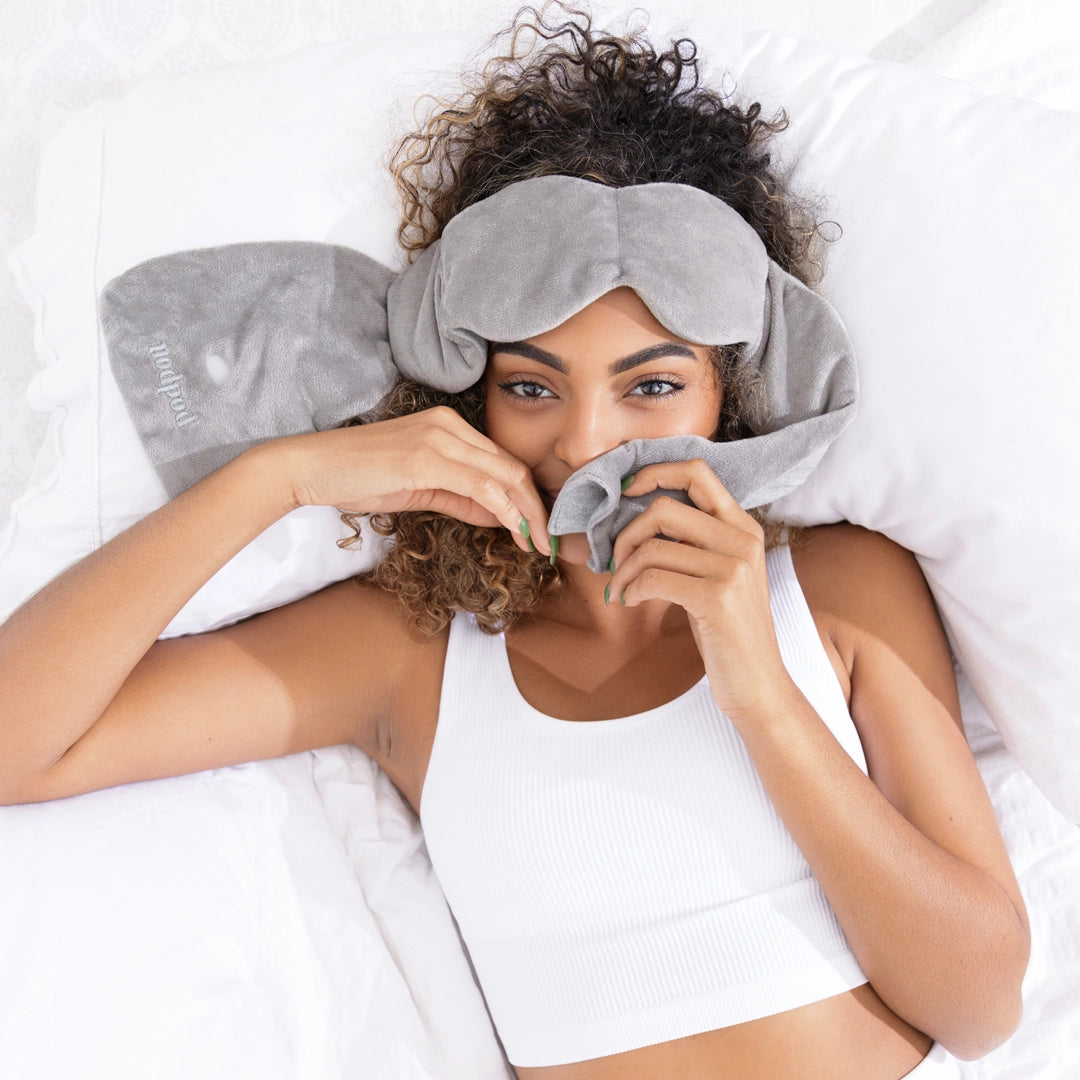 Woman with nodpod eye mask on head