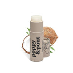 Tube of Poppy & Pout Island Coconut Lip Balm on a white background. The eco-friendly cardboard tube features a tropical floral design with black text, offering a hydrating lip balm with a natural coconut scent.