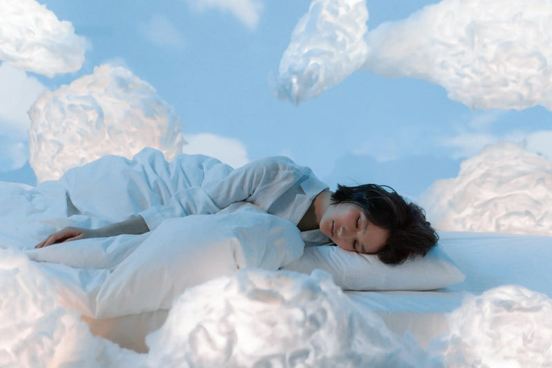 Woman sleeping on a cloud