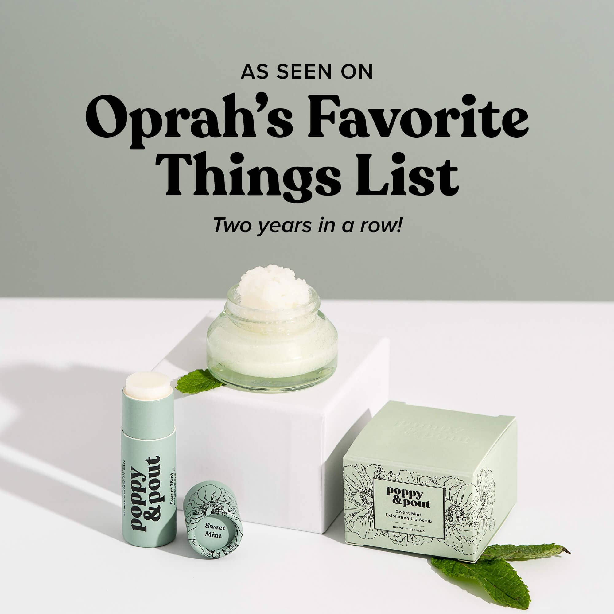 Poppy & Pout Sweet Mint Lip Balm featured with the text 'As Seen on Oprah’s Favorite Things List - Two years in a row!' The mint green lip balm tube is displayed alongside fresh mint leaves, highlighting its natural ingredients and popular recognition. This image emphasizes the product’s quality and appeal, as endorsed by Oprah's Favorite Things list.