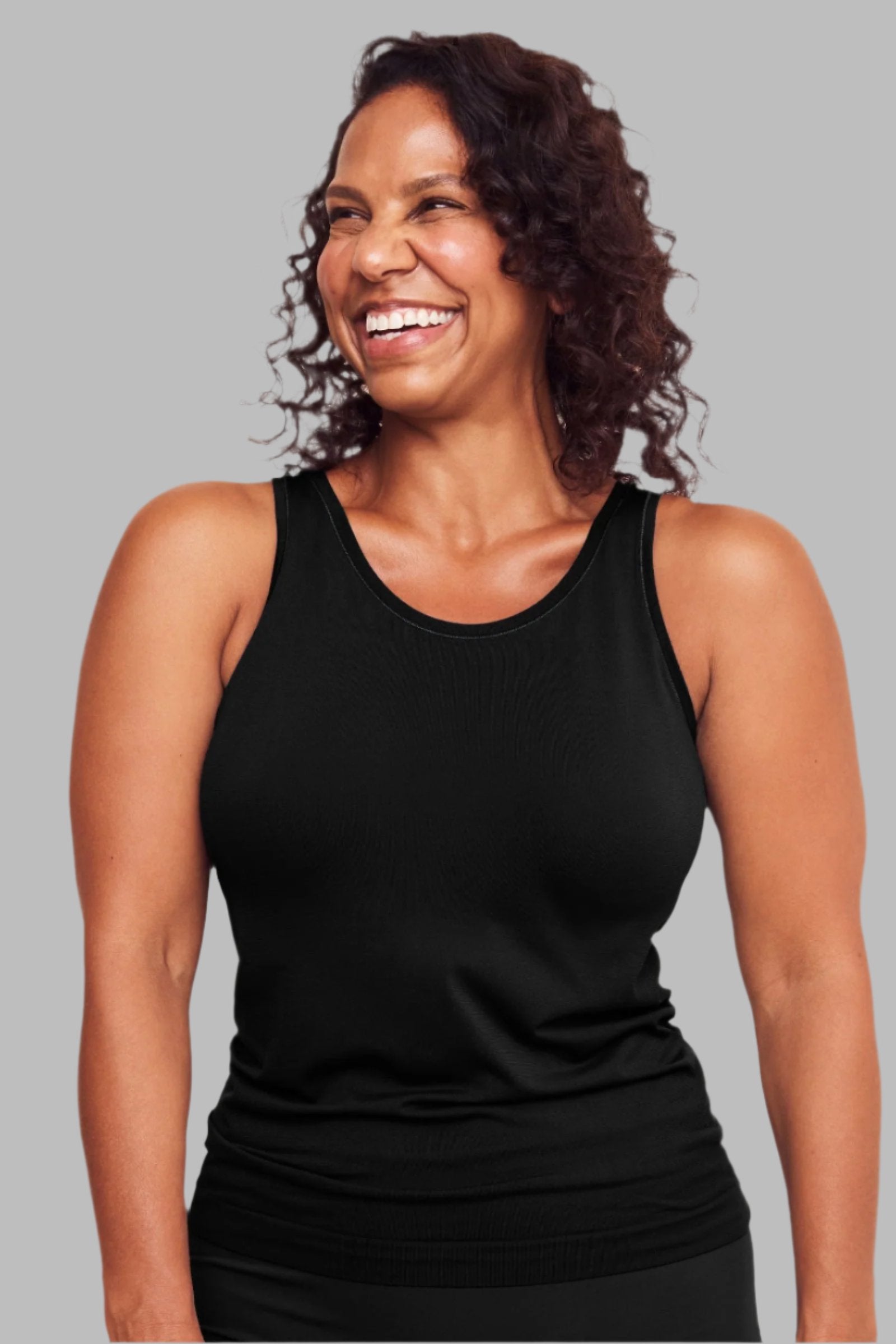 Anti-Flush Tank Top in black, back view on a white background. The image showcases the tank top's racerback design, offering both comfort and style for women seeking hot flash relief during perimenopause and menopause.