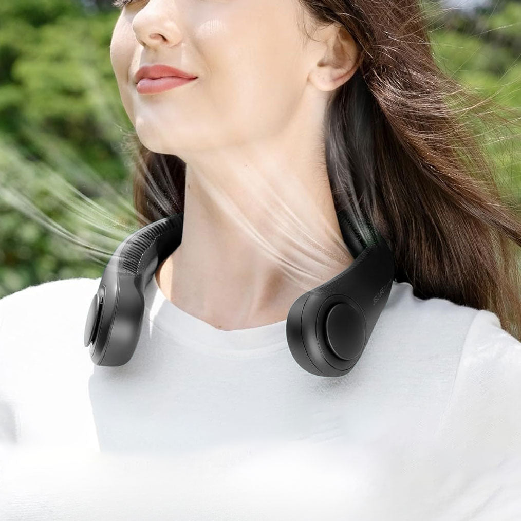 Cooling Neck Fan worn by a woman in perimenopause, offering effective relief from hot flashes and night sweats. This hands-free, portable fan is designed to keep women comfortable during menopause with adjustable settings.