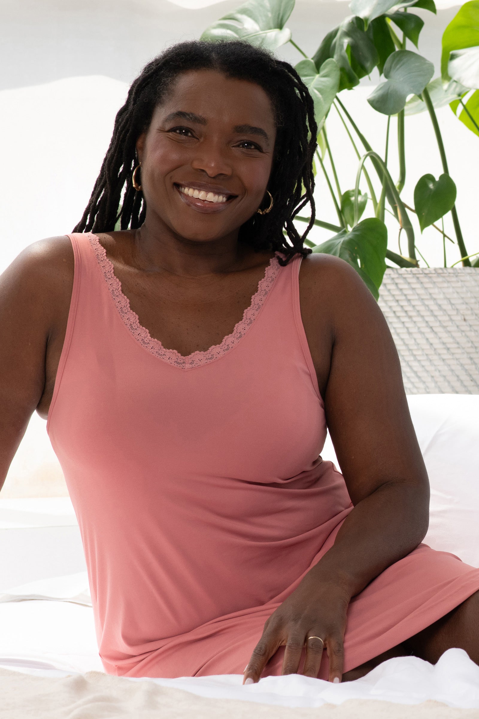 Woman wearing the Lace Trim Anti-Flush Nightie in rose color, front view. The model demonstrates the nightie's flattering fit and elegant design, suitable for various occasions while providing hot flash relief.